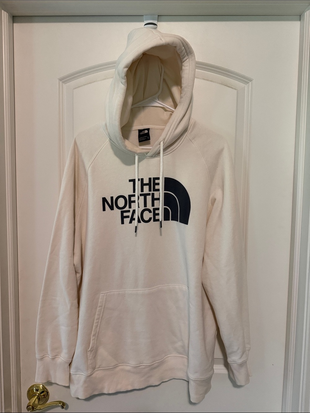 The North Face Cream Hoodie with Black Logo